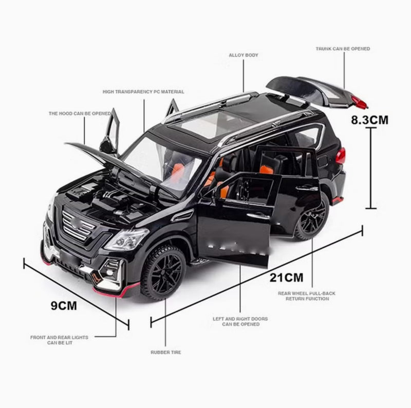 Black Nissan Patrol 1:24 diecast toy car front angle view