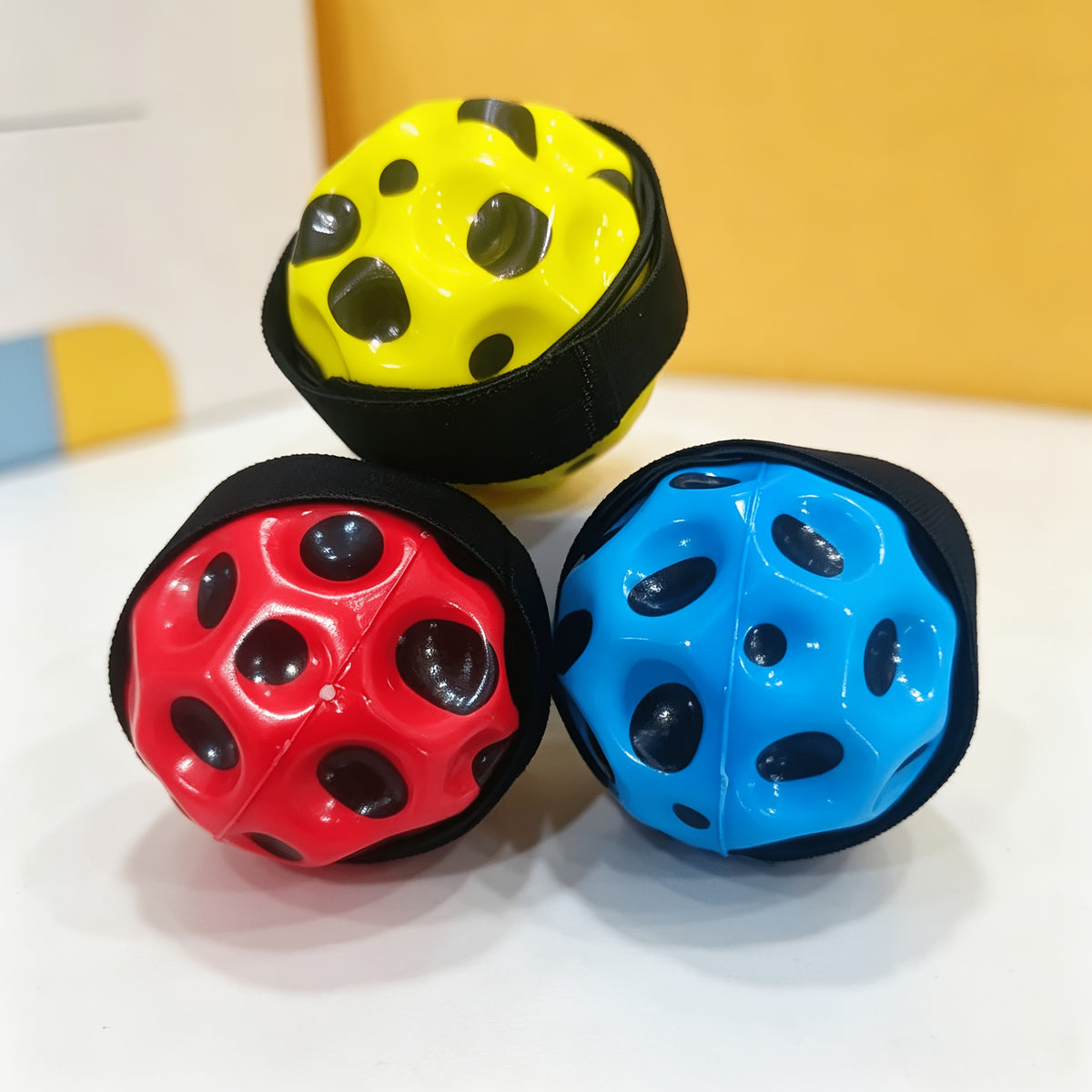 Moon bouncing ball with handle