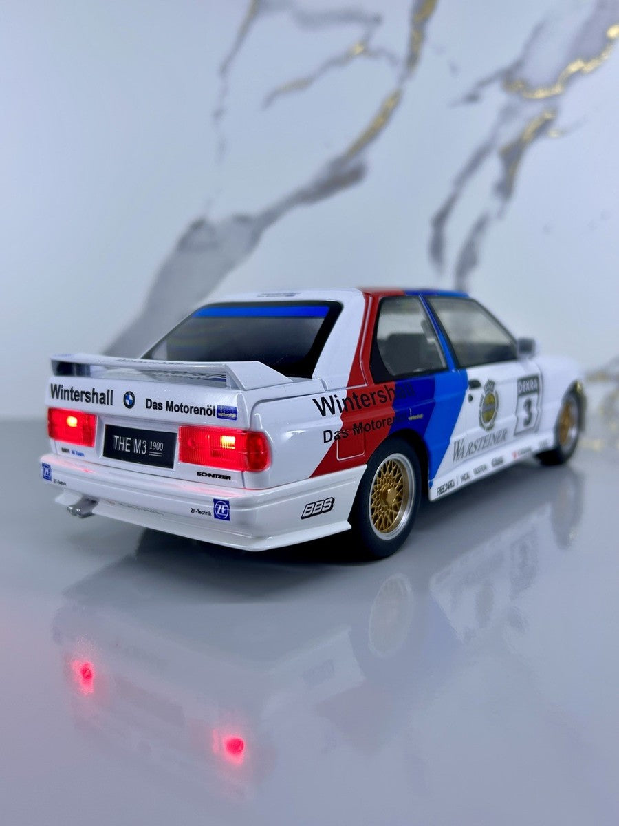 BMW M3 E30 DTM 1:24 diecast toy car rear angle view