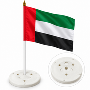 Round white flagpole holder base pictured with UAE flag mockup; flag and pole sold separately