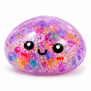 One purple translucent glitter Orbeez-style dumpling sensory squishy toy with smiley face on white background