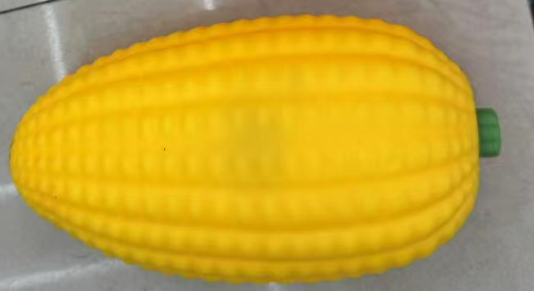 Original supplier photo: Plump yellow corn squishy with moulded kernel rows and a short green stem